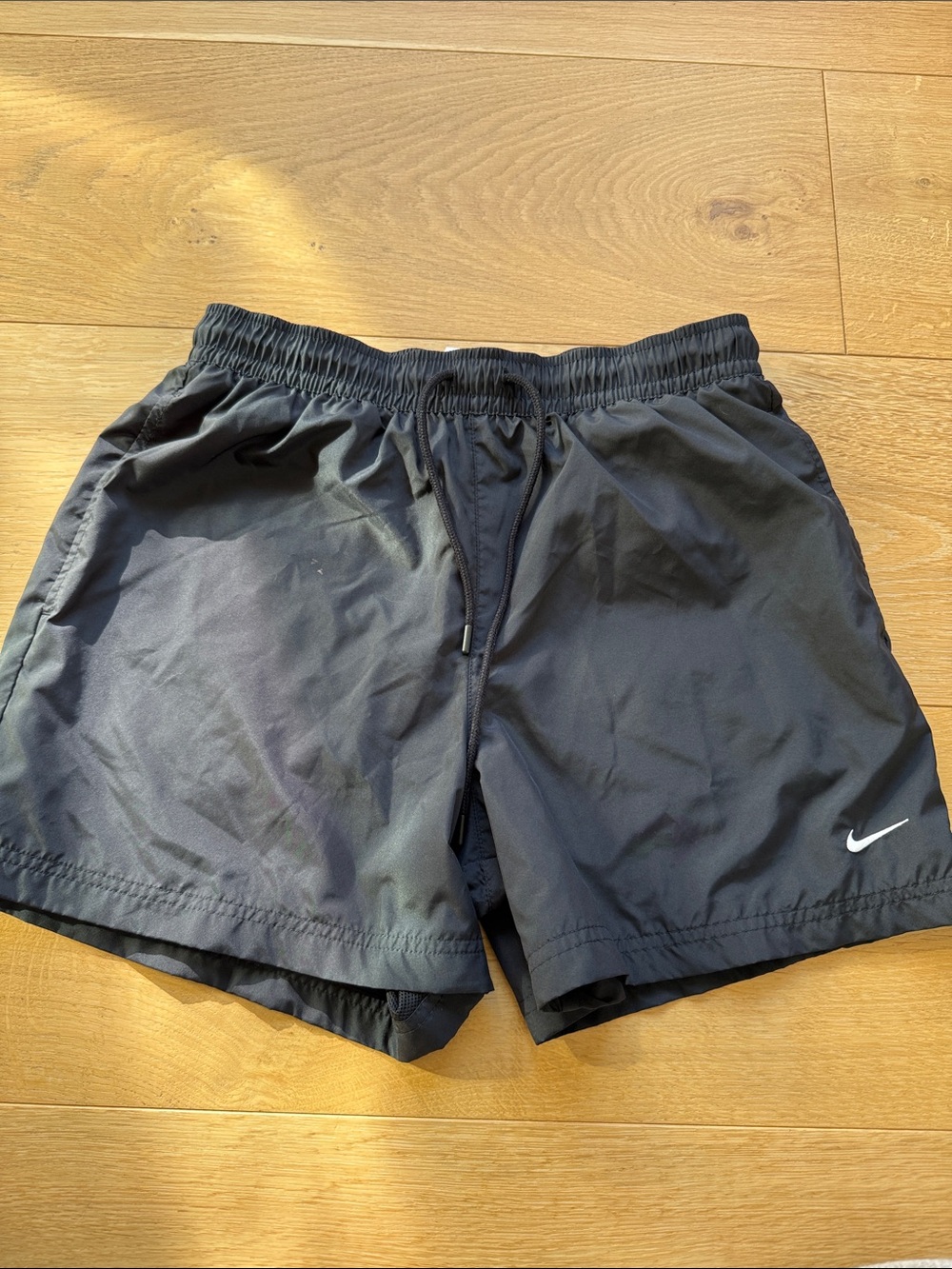 Nike Men's Black Athletic Shorts with White Swoosh